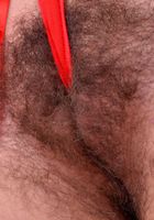 Aali tugs on her fur then yanks her pink lips apart., Aali Rousseau (aul001) ATK Natural & Hairy: Aali Rousseau (Aali tugs on her fur then yanks her pink lips apart.)