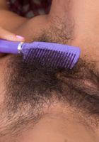 Vivi brushes her big hairy muff., Vivi Marie (viv016) ATK Natural & Hairy: Vivi Marie (Vivi brushes her big hairy muff.)
